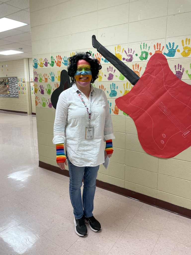 Teacher dressed up as book character.